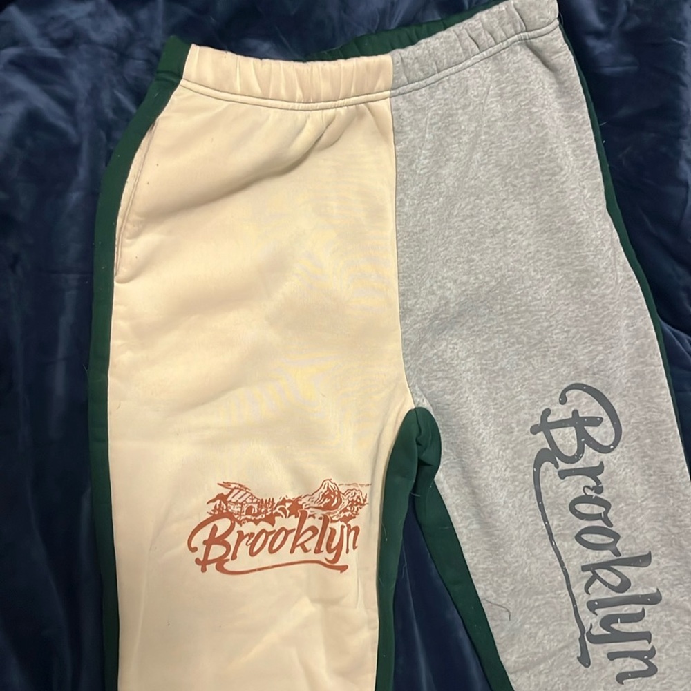 tan grey and green sweatpants